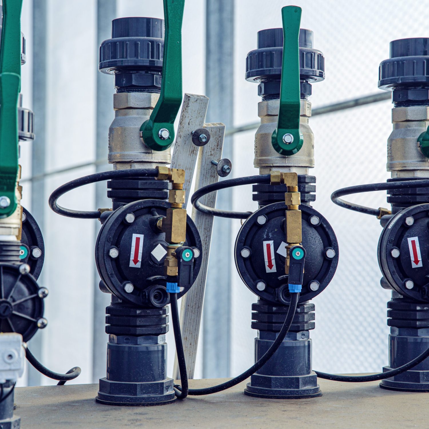 Valves, cables and piping as found inside of a modern industrial power plant