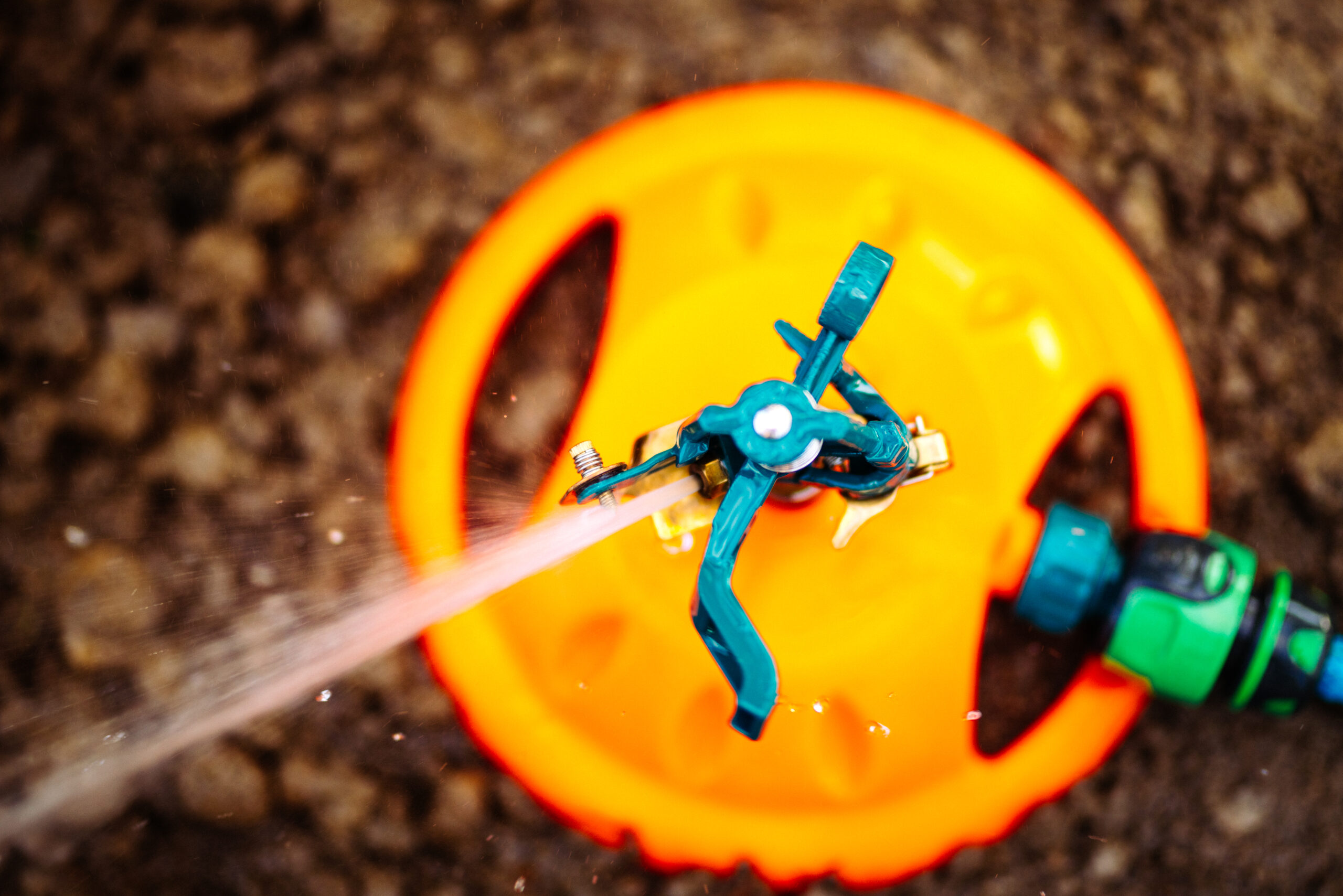 Close up details and top view of garden grass sprinkler