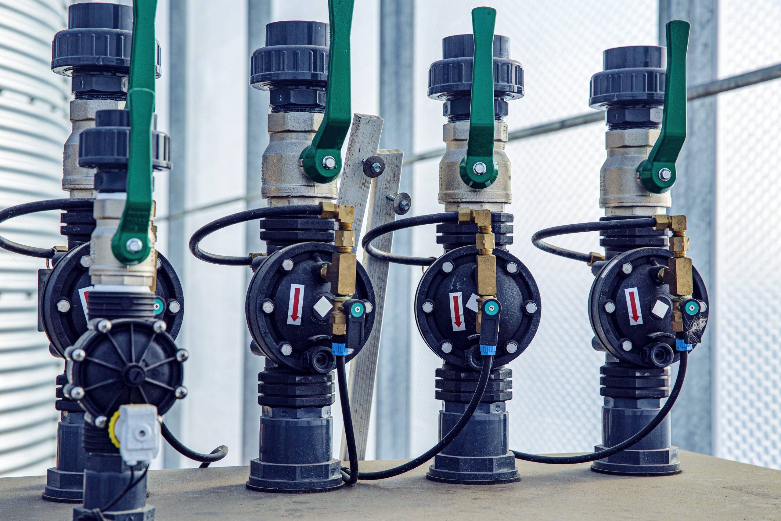Valves, cables and piping as found inside of a modern industrial power plant
